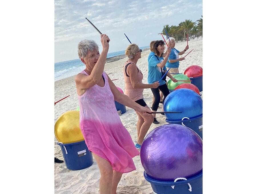 Villagers take cardio drumming to the Bahamas